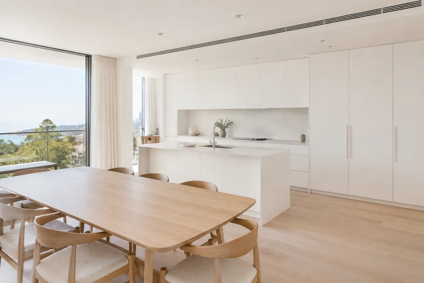 Made for gathering. A generous shared space, with white joinery and pale timber connecting cooking, dining and conversation. AI-generated Sydney design concept, not a completed project.